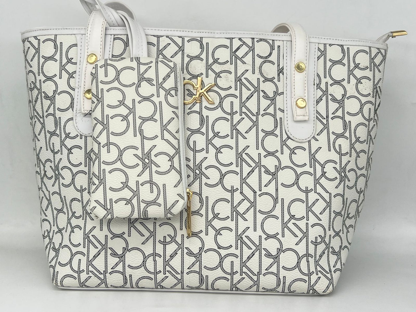 "شنطة توت باج حريمي - جلد لوجو CK Style - عملية وشيك (بـ محفظة صغيرة)"