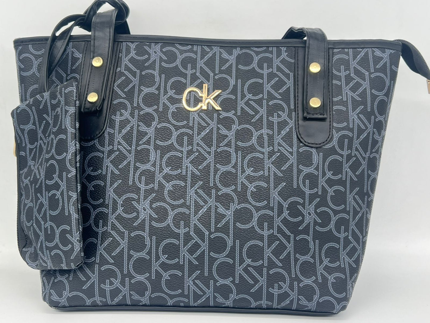 "شنطة توت باج حريمي - جلد لوجو CK Style - عملية وشيك (بـ محفظة صغيرة)"