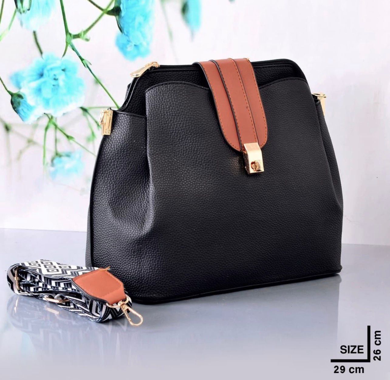 "شنطة كروس حريمي بتصميم راقي - يد عريضة مزخرفة وقفل ذهبي (ألوان شيك)"