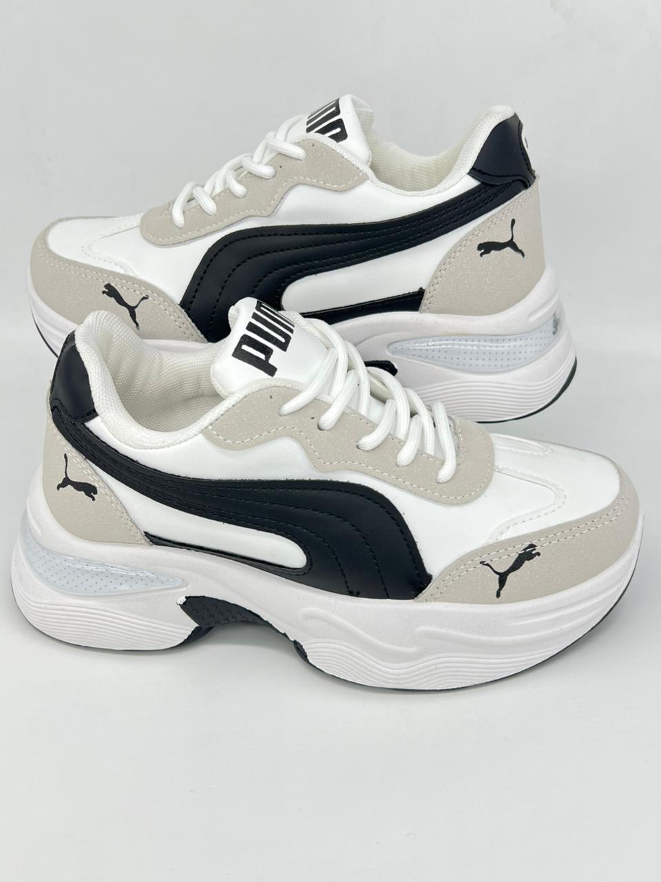 شوز بوما 2026 | Puma Winter Collection – أسود × نبيتي × دهبي