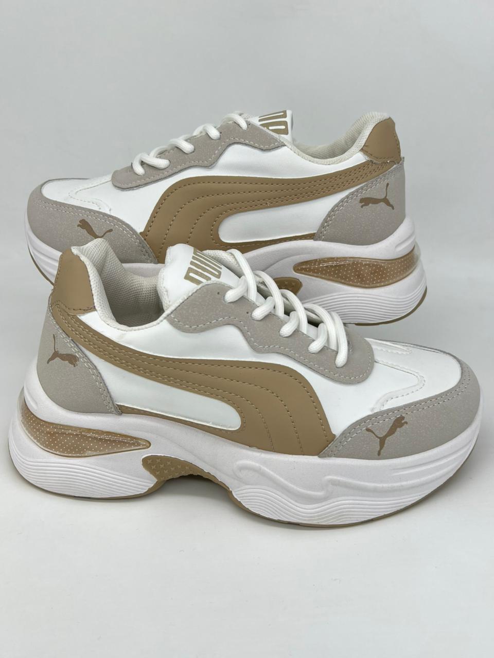 شوز بوما 2026 | Puma Winter Collection – أسود × نبيتي × دهبي